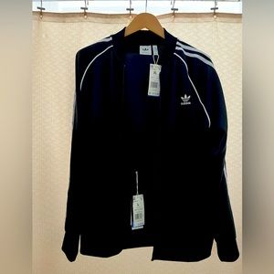 Adidas SST Prime Blue Track Suit New.   Jacket is XL Pants are L